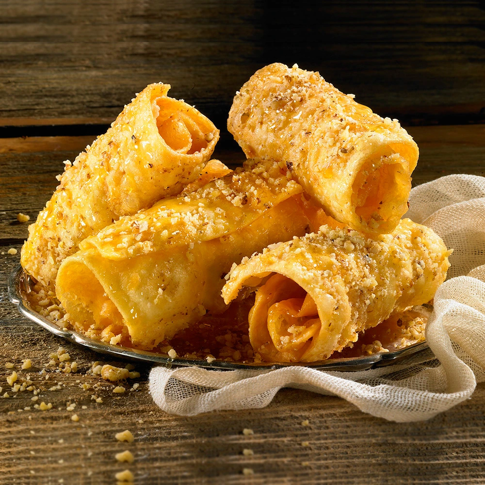 Λαχταριστές χειροποίητες δίπλες με μέλι και καρύδια